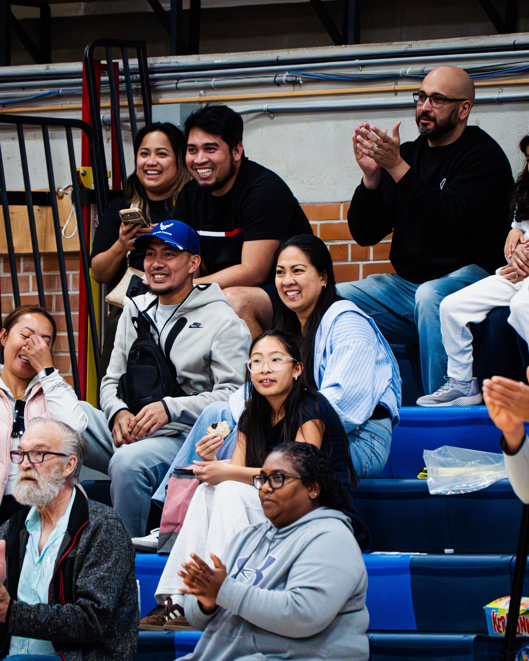 Families watching a game from the stands